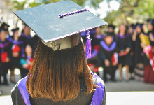 girl wearing cap and gown