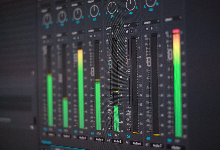 graphical eq bars in green and red with knobs and switches